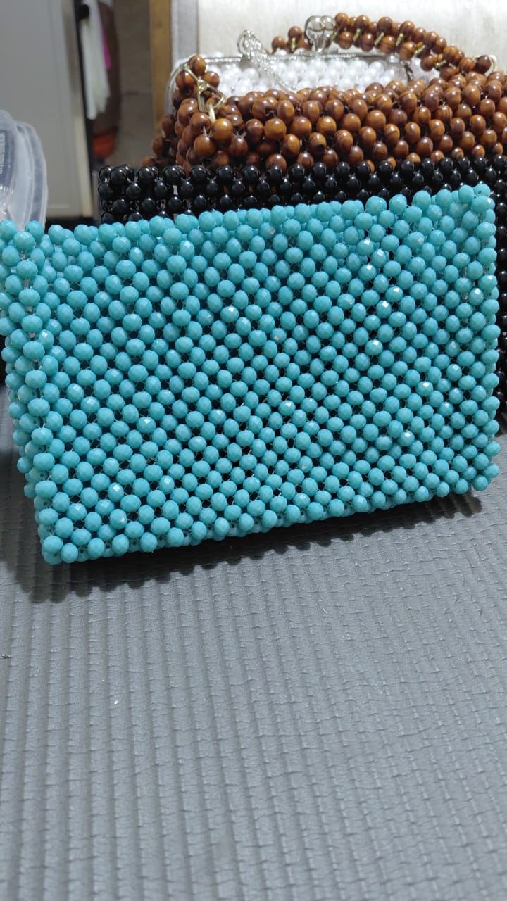 Aqua — Turquoise faceted beads, woven by hand.